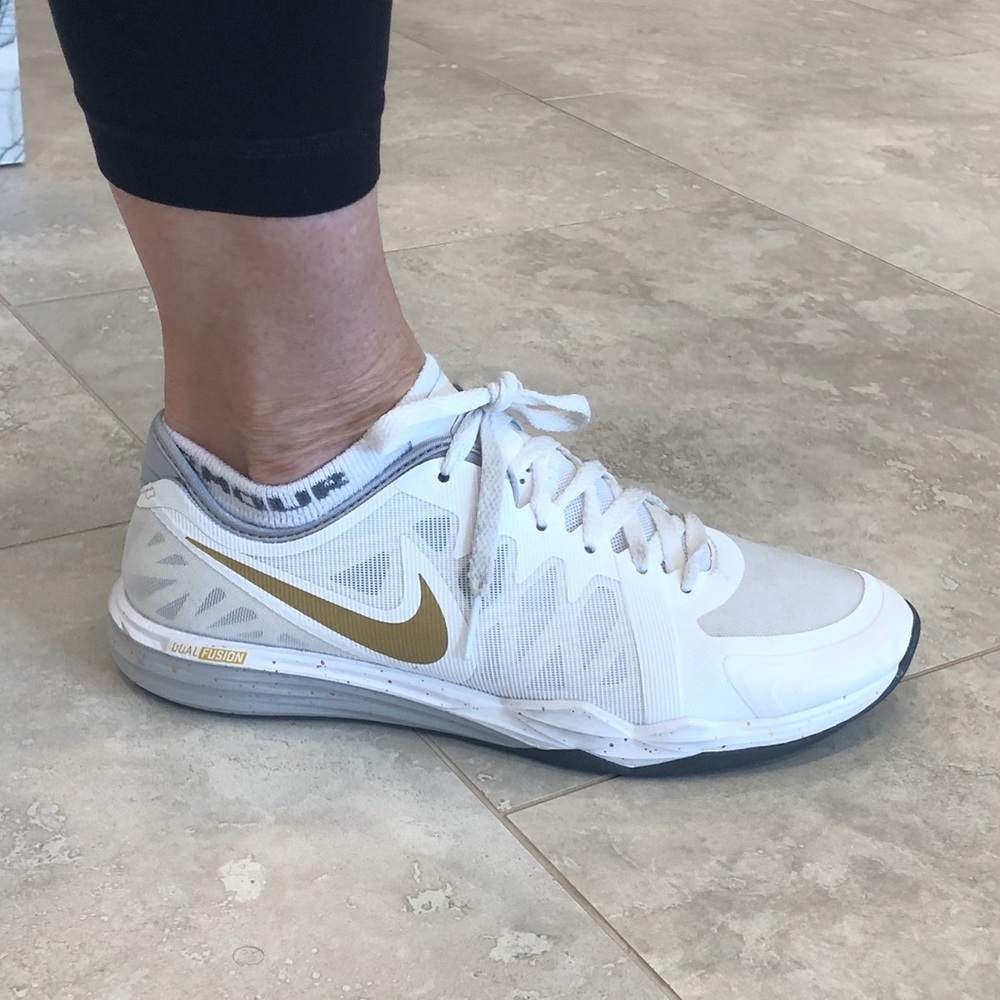 Womens white leather and mesh Nike sneakers